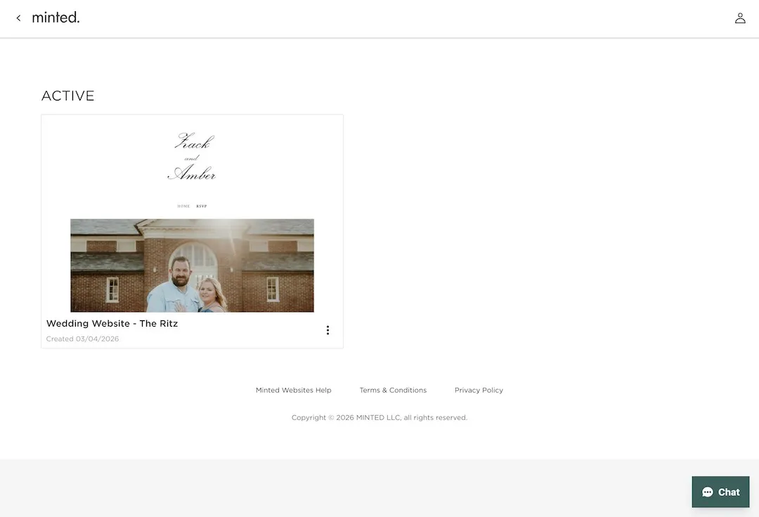 Minted dashboard showing an active wedding website titled Zack and Amber with a photo of a couple in front of a brick building